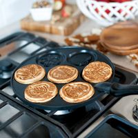 Autumn is here! Pancakes with fall designs will taste as good as they look. Seven 3-inch cavities. Create charming fall pancakes for a delicious breakfast on the stovetop. This pan creates seven designs: three leaf variations, an acorn, a pumpkin, an apple, and a sheaf of wheat.