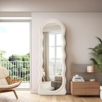 With generous dimensions of 63"x24", this top arched full size mirror offers a perfect view from every angle, making it a versatile addition to your space. Whether hung or leaned against the wall, it effortlessly enhances the ambiance of cloakrooms, bedrooms, living rooms, corridors, and even chic clothing shops. 