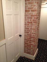 Exposed brick chimney.