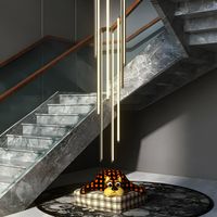 This staircase chandelier is composed of quality aluminum, and it comes with an acrylic shade and built-in LED light sources ensuring bright and even lighting, and providing a long-lasting lighting solution for your home.