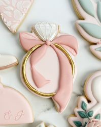 I’m absolutely obsessed with this blush bridal shower cookie set. The bows, the florals, and the lace accents are my favorite! Dress, floral, cowboy boot, and leaf cutter are my designs and you can find the STL on my website. All other cutters are tagged! . #bridalshowercookies #weddingcookies #engagementcookies #dresscookies #ringcookies #pinkcookies #shestyingtheknot #bowcookies #gardenpartybridalshower #floralbridalshower #greenerycookies #royalicingcookies #decoratedcookies #cookieinspo...