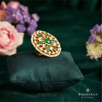 Immerse yourself in the depths of the green emeralds adorning the exclusive royal wedding rings by Madhuban Jewellers! Tap the link in bio to explore this product over a video call. DM us to know more about this product. WhatsApp us on 9167724442 #manubhaijewellers #weddingsbymanubhai #manubhaibride