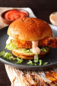 This air fryer spicy chicken sandwich recipe is made with a juicy, crispy chicken patty topped with spicy mayonnaise all served on a brioche hamburger bun.