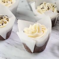 The BEST chocolate cupcakes ever! They are super soft, rich and topped with a lush buttercream frosting! #chocolate #chocolaterecipes #cupcakes #cupcakerecipes #baking #desserts #dessertfoodrecipes #dessertrecipes #recipes #videos #recipevideo #iheartnaptime