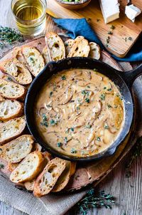 If you’re hosting a party soon, then you absolutely need to make this easy hot caramelized onion dip! It's gourmet comfort food in a gooey cheesy appetizer! The recipe is super simple and it doesn't have to be baked, so it saves you oven space! It's so good! #holidays #appetizer #recipe #Christmas #NewYears