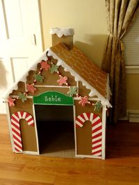 I wanted to decorate my dogs crate for Christmas so I built this Gingerbread dog house from a cardboard box. She can use it as an indoor dog house or I can use it to cover her crate when we have company over!