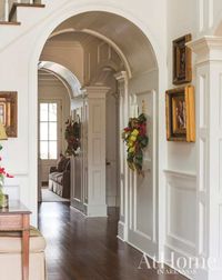 Arches along with panel molding create this lovely traditional style.