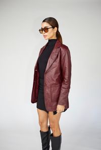 Express yourself in this stunning burgundy 90's inspired leather blazer. A staple blazer that can be worn dressed up or dressed down for all occasions year after year. Genuine sheepskin leather. Model is 5'8/119lbs wearing size small.