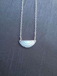 Minimalist Style; this handmade modern bib pendant hangs on a 16" sterling silver chain. Made for everyday wear.($40)