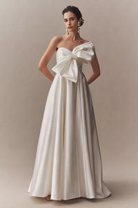 Wtoo by Watters Nanette Asymmetrical Bow-Front Wedding Gown | Anthropologie