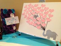 Baby Shower guest book alternative: elephant themed on stretched canvas. Filled with pink paper balloon hearts guest could sign. Created by LessThanThree Designs.  www.facebook.com/lessthanthreedesigns