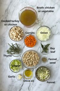 Ingredients for white bean soup with turkey or chicken with herbs and aromatics.