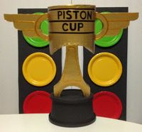 In preparation for my son's Disney CARS themed birthday party, I built a Piston Cup for a centerpiece.       Here's how:   MATERIALS  - plas...