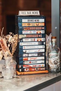 Unique wedding bar drinks menu sign made from old VHS tapes | Suzy Elizabeth Photography