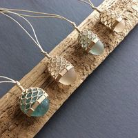 Tim Whitten. A beautiful way to turn those pieces of sea glass you find into jewelry.