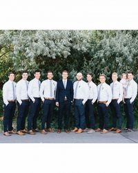 The groom chose a navy blue suit from H