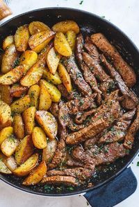 Garlic Butter Steak and Potatoes Skillet - This easy one-pan recipe is SO simple, and SO flavorful. The best steak and potatoes you'll ever have!