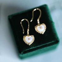 Holiday Notice: We will be on holiday from Feb 6 to Feb 15 for the Spring Festival. Orders will be shipped after we resume work.  Christmas Gifts for Lovers, Heart Dangle Drop Earrings, Dainty Heart Earrings, Mother of Pearl Heart Earrings, Small Heart Drop EarringsFeatures• Made to Order. • Material: 925 Silver with Gold Plated• Gold Color: Yellow Gold• Stone: Mother of Pearl & CZ• Ready to Ship in 7-10 Business Days Want to find out more? Check out my shop https://www.etsy.com/shop/ZoeJewe