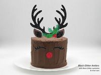 This Reindeer Antlers Cake Topper Kit by FlyingOwlStudio on Etsy will definitely wow all the guests at your Christmas party, baby shower, or December birthday party! Included are antlers, ears, eye lashes, red nose, and holly berries with green leaves. It's a fun and easy way to take your xmas event decor to a whole new level of gorgeous! Available in a variety of glitter and foil colours.