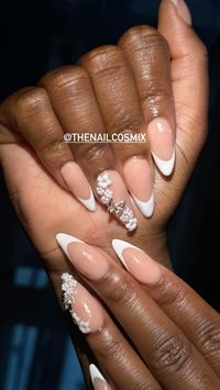 Almond French tip with flower & butterfly feature nail #frenchtipnails #nailart #nailinspo💅🏻 #nailinspo #nailsoftheday #explorepage #acrylicnails #almondnails #nailstagram