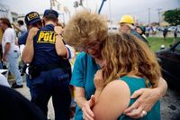 Mourners after the April 19, 1995 Oklahoma City bombing \ by People Staff April 19, 2019 02:25 PM