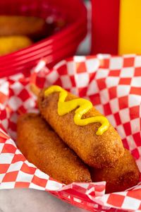 These Hand Dipped Corn Dogs are covered with a thick cornbread coating and fried to golden brown perfection. It’s just like they make them on Main Street at Disneyland’s Little Red Wagon.