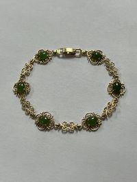 "Antique 14K Yellow Gold Green Jade Filigree Link Bracelet. This bracelet is 7 inches in length, 1/2 inch in width, and weighs a total of 6.70 grams. The bracelet is tested and stamped 14k gold; it is also stamped \"EB inside diamond\"; we could not identify this hallmark. This pre-owned bracelet is in good condition and is ready to be worn! Willing to answer any questions and send more pictures if requested, please feel free to ask! Please come check out other stunning unique jewelry pieces lis