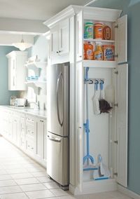 I love how this broom closet is set up (just needs a bit more space for the vacuum.)