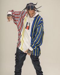 Tyga wears AKINGS Omari, a slim fit waxed denim. Tyga fashion