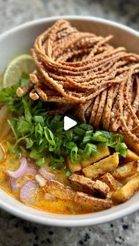 Ramya Ramesh | vegan chef on Instagram: "SOUP-ERB NOODLE SOUPS EP 1: Khao Soi (Thai Coconut Noodle Soup)🍜

Comment “SOUP” to get the full recipe sent to you directly via DM!

Khao Soi is a mouthwatering and aromatic dish originating from Northern Thailand and is particularly popular in Chiang Mai. It is usually a rich, coconut-based curry broth flavoured with spices and aromatics like turmeric, cardamom, coriander seeds, shallots, garlic and chili. 

It’s actually wayy simpler to make it at home than you think so check out my full recipe here: https://browngirlveganeats.com/vegan-khao-soi-thai-coconut-noodle-soup/

#vegan #veganfood #veganfood #plantbased #vegansofig #vegansofinsta #vegansofinstagram #veganshare #veganfoodshare #noodles #khaosoi #soupseason #fallrecipes #fallsoups #thaino