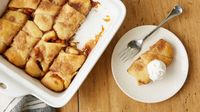 Say hello to your new favorite fall dessert! These easy baked dumplings are stuffed with an irresistible pumpkin-cream cheese filling and topped with brown sugar.