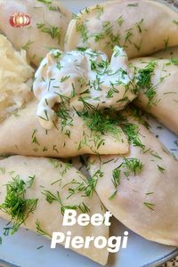 A delicious vegan beet pierogi recipe with roasted shredded beets, potatoes, caramelized onion and fresh dill. Perfect for the holidays or any time. #veganperogies #veganperogiesrecipes #veganpierogi #veganpierogirecipes #beetpierogi #pierogifilling #veganpierogifilling #vegetarianpierogies #pierogivegetarian #veganbeetrecipes #beetsvegan #veganholidayrecipes #veganxmas #veganslavicfood #slavicvegan #beetsanddill #plantbasedperogies #pierogivegan