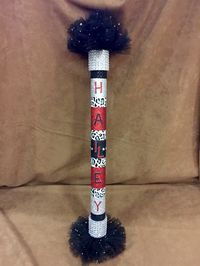 DIY CHEER SPIRIT STICKS I made for each girl on my daughters cheer squad. PVC pipe, contact paper, duct tape, rhinestones A TON of glue and gift bows.