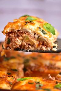 This recipe for keto zucchini lasagna will be your favorite healthy comfort food! Zucchini layered with a rich meat sauce and a creamy cheese mixture, it's low in carbs but full of flavor!