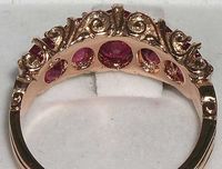 "This beauty is wonderful handcrafted 14K Solid Rose Gold Victorian Style Filigree design ring made by us. We have set this particular example with stunning vibrant oval cut faceted rubies measuring 7x5mm (0.28\"x0.20\" inches), two 6x4mm (0.24\"x0.16\" inches) & two 5x4mm (0.20\"x0.16\" inches) which look fabulous set against the polished Rose gold. Your ring will come with the full British Hallmark which includes 585 (the gold purity mark for 14K), the Leopards head and the Royal Crown. Th