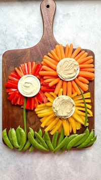 Cheese, Charcuterie, Fun Food Boards & MORE | •HUMMUS & VEGGIE FLOWERS• How cute are these VEGGIE flowers??!! Perfect for Easter or any springtime gathering! 🌺🌼🌺 I used red/yellow… | Instagram