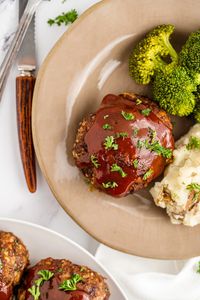 A fun spin on the classic dinner dish, these Mini Meatloaves are as tasty as they are adorable! With the sweet, tangy glaze and tender meat, this quick recipe is