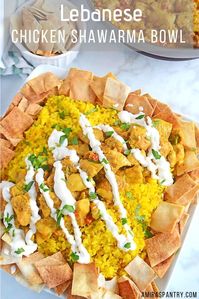 Lebanese Chicken Fatteh recipe loaded with Middle Eastern flavors. Chicken Shawarma perfectly marinated and cooked with yellow rice and crunchy pita bread. Chicken Shawarma Fatteh bowl is a delicious recipe you don’t want to miss. #amiraspantry #Chicken #Fatteh #Lebanese #MediterraneanRecipes