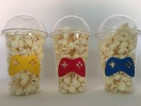 These are great for any gamer inspired party. Each cup is 16 oz. and made from a sturdy disposable plastic. These are decorated with vinyl stickers and come with dome lid. Each lid has an opening on the top. These are perfect for small children who easily spill. You can also stuff these with candy, snacks, and little toys for a great party favor. Please click the amount button to see pricing on these cups. If you want a different amount then what is available please message me for a custom listi