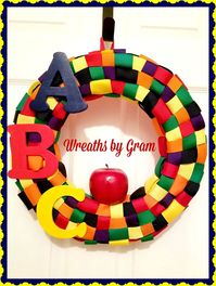 ABC wreath, teacher wreath, teacher appreciation gift ideas from class, first grade classroom decor ideas, kindergarten teacher gifts end of year from class, school wreaths for teachers, end of year teacher gifts preschool kids, teacher gifts end of year elementary, primary colors decorations classroom decor #teacherlife #teachergifts #teachers #wreaths #endofyear #preschool #kindergarten #firstgrade #teacherappreciation