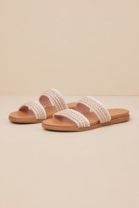 You'll be more than ready to stroll through the sunshine with the Galatia Natural Multi Woven Slide Sandals! These effortlessly cute sandals have a woven fabric construction (in neutral hues of ivory, beige, light brown, and taupe) that shapes a wide toe strap and matching vamp, atop an almond footbed. The simple slide-on design makes for easy, everyday styling! 0. 5" rubber heel. Smooth insole. Felted rubber sole has nonskid markings. Man made materials. Imported. Lulus | Galatia Natural Multi Woven Slide Sandal Heels | Size 9.