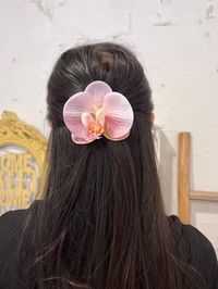 Made to order Made of PU , LOOKS  REALISTIC  and designed and handmade in California.  it's easily to placed in the hair and secure once in place. Metal Alligator Clip. Flower is 3.5 inches in diameter. We offer a FANCY box to place item. We also provide anther colors Orchid Butterfly Clips, just send a message to us.