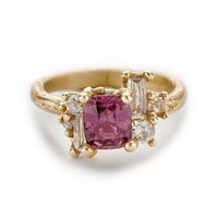 Description One of a kind asymmetric cluster ring featuring a beautiful composition of mixed cut champagne and white diamonds arranged around a deep pink sapphire, on a gently textured band ruth-tomlinson-separator 14ct yellow gold, pink sapphire, mixed cut champagne diamonds Band width: 2.8mm Setting detail: 11mm x 14mmSapphire: 1.82ct; diamonds: 0.43ct total Handcrafted from 100% recycled gold and responsibly sourced gemstones ruth-tomlinson-separator A gorgeous example of an 'heirloom-to-be'