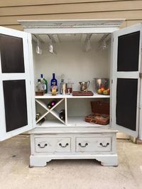 Updated armoire to make into a bar (replaced wood on back so there were no holes)