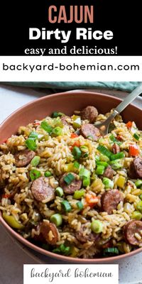 New Orleans Cajun Dirty Rice is made with Cajun sausage, white rice, bell peppers and features a spicy seasoning blend. This traditional Cajun rice dish is hearty, easy to make, and inexpensive!