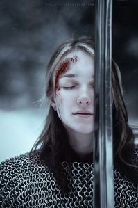 And there she stood frozen in both mind and body as she fell. Blood trickled down the side of her face and her sword came up so she whisper sweet goodbye to him. All the while the enemy prowled circles around her