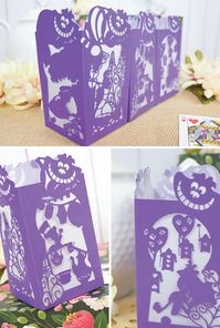 Alice in Wonderland Paper Lantern - Designs By Miss Mandee. Watch the Cheshire Cat disappear, take part in a mad tea party, and play a rousing game of croquet in this Disney paper lantern design! Download the SVG cut file and pdf template for FREE!!