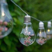 Flower Garlands - Softly brighten your wedding decorations with this string of 20 cute bulbs. Each bulb is filled with pink dried flowers and offers a soft glow, creating a warm, romantic ambience. #flowergarlands #flowers #weddingflowers #weddingdecor #weddingdecorations #wedding #weddingideas