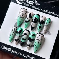 Welcome to LD Nails! 🖤 One set of 10 REUSABLE Press On Nails 🖤 🖤 Made to order in your shape & size 🖤 🦇 Witching Hour: hand painted spooky Halloween press on nail set. Pink and green blended ombré glow in the dark base with black and white hand painted spooky details: Bats, Moons and Stars Purchase INCLUDES an application kit! It consists of: 🖤 detailed application & removal instructions 🖤 a sealed and sanitary mani kit (100/180 file, buffer block, cuticle pusher) 🖤 2 alcohol pads 🖤 nail tabs or glue (glue is standard, request tabs in the personalization box if you prefer them!) *Only one kit is sent per order. Extra kits and kit contents can be picked up in the “Extras” section! Est. 2020: LD Nails specializes in custom Gothic, Witchy and Alternative Press On Nails. I draw inspir