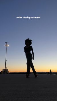 Natural hair girl silhouette roller skating at sunset in san diego in pink moxi roller skated and light up wheels aesthetic #rollerskating #sandiego #patines #sunset #naturalhairtips #silhouette #motivation